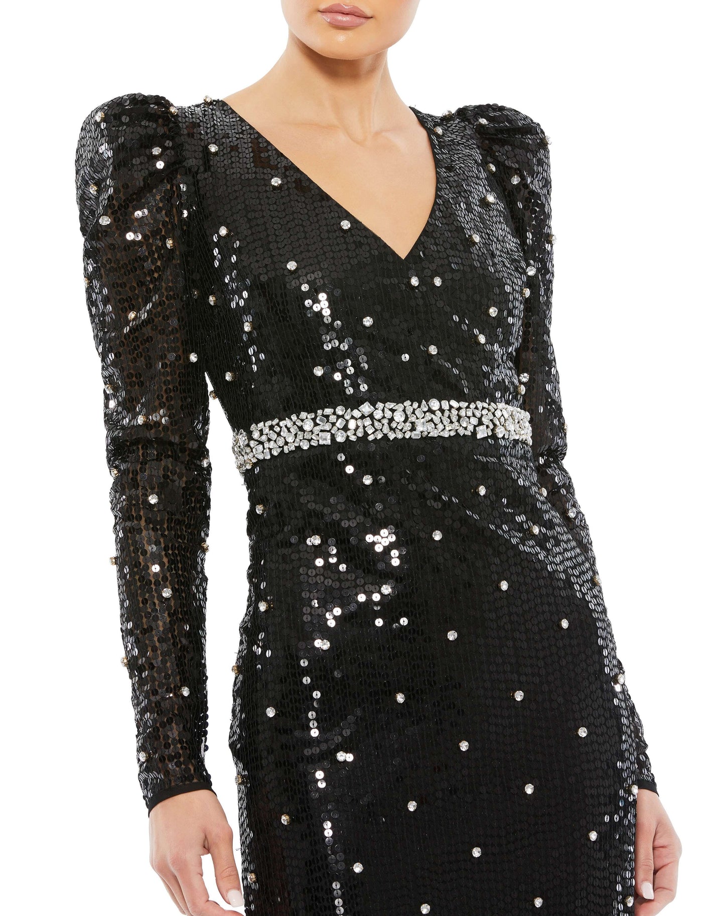 No one does sequin gowns better than Mac Duggal, and this on-trend dress is such a fun way to don the shimmery embellishments. The gala-glam gown is styled with a V-neckline, puff-shoulder long sleeves, and a leg-flaunting high slit. To kick up the shine