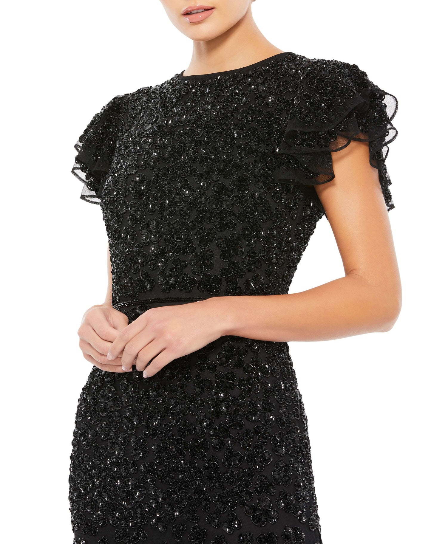 Elegant full-length evening gown with a high round beck and feminine flutter cap sleeves. Dress is fully embellished with tonal sequined and beaded flowers, and the natural waist is defined by a hand-beaded belt. Mac Duggal Fully Lined Back Zipper Hand-Be