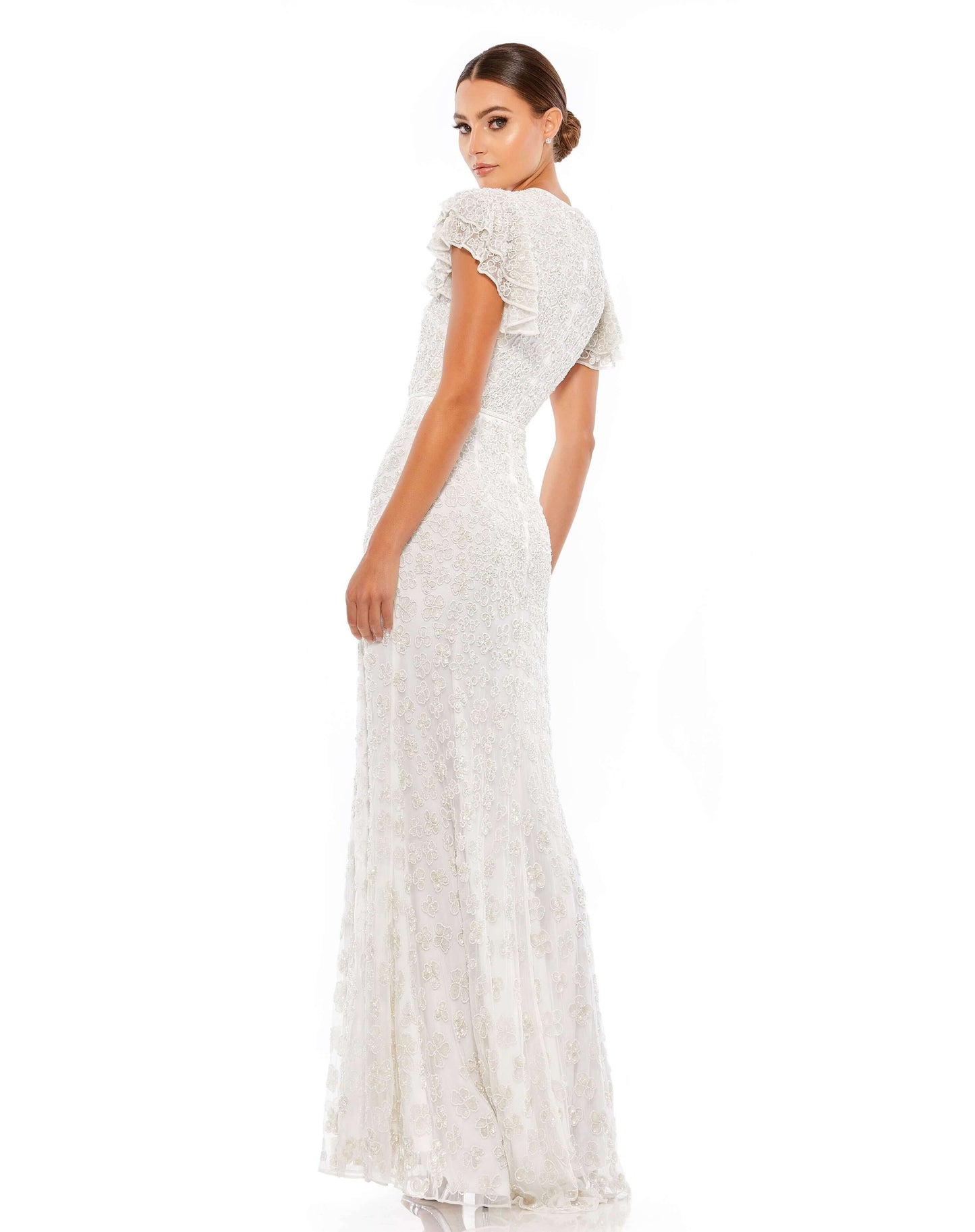Elegant full-length evening gown with a high round beck and feminine flutter cap sleeves. Dress is fully embellished with tonal sequined and beaded flowers, and the natural waist is defined by a hand-beaded belt. Mac Duggal Fully Lined Back Zipper Hand-Be