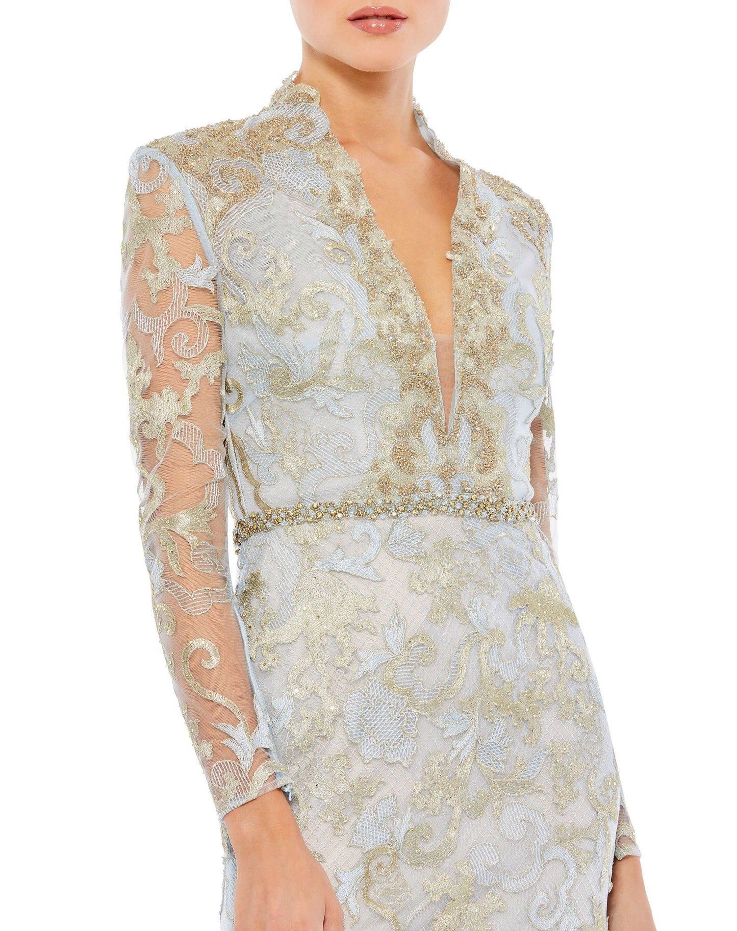 Long sleeve v-neck gown with decorative metallic-gold applique and embroidered detail throughout. Natural waist is accent by a hand-beaded belt. Mac Duggal Partially Lined Back Zipper 100% Polyester Long Sleeve Full Length V-Neck Style #11165