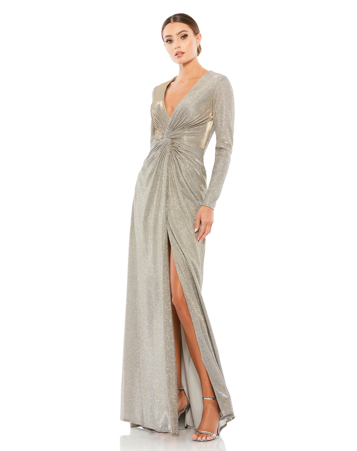 Sparkling metallic long-sleeve gown accented with a twist-front plunging neckline and a thigh-high slit. Ieena for Mac Duggal Fully lined Bust Pads Back Zipper 100% Polyester Long Sleeve Thigh-high Slit Full Length V-Neck Style #26194