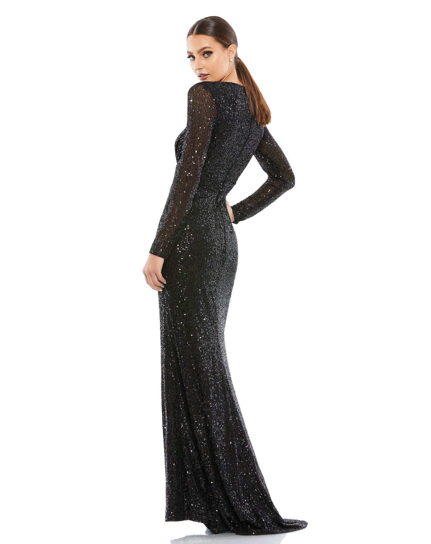 Long sleeved fully sequined evening gown accented with a ruched waist and thigh-high front slit. Ieena for Mac Duggal Fully Lined Back Zipper 100% Polyester Long Sleeve Approx. length from shoulder to hem: 62.5" V-Neck Style #26490