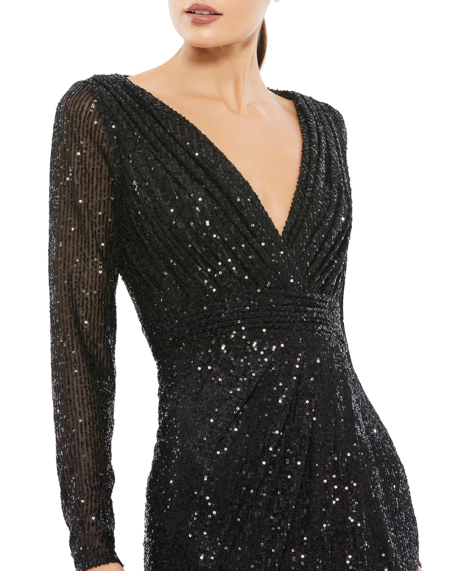 Long sleeved fully sequined evening gown accented with a ruched waist and thigh-high front slit. Ieena for Mac Duggal Fully Lined Back Zipper 100% Polyester Long Sleeve Approx. length from shoulder to hem: 62.5" V-Neck Style #26490