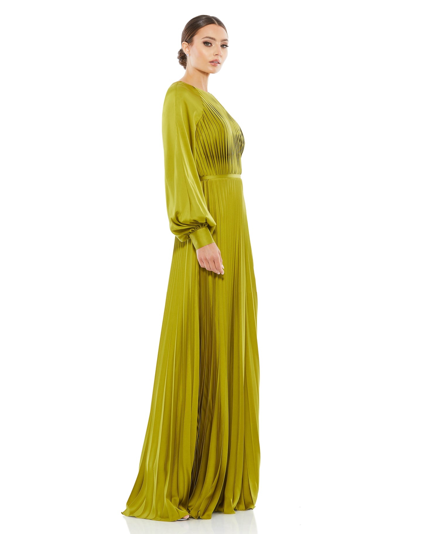 Long sleeve pleated gown with a high neckline, blouson sleeves, pleated bodice and skirt, and a thigh-high slit. Ieena for Mac Duggal 100% Polyester Back Zipper Full Length Long Sleeves Thigh-High Slit Style #26590