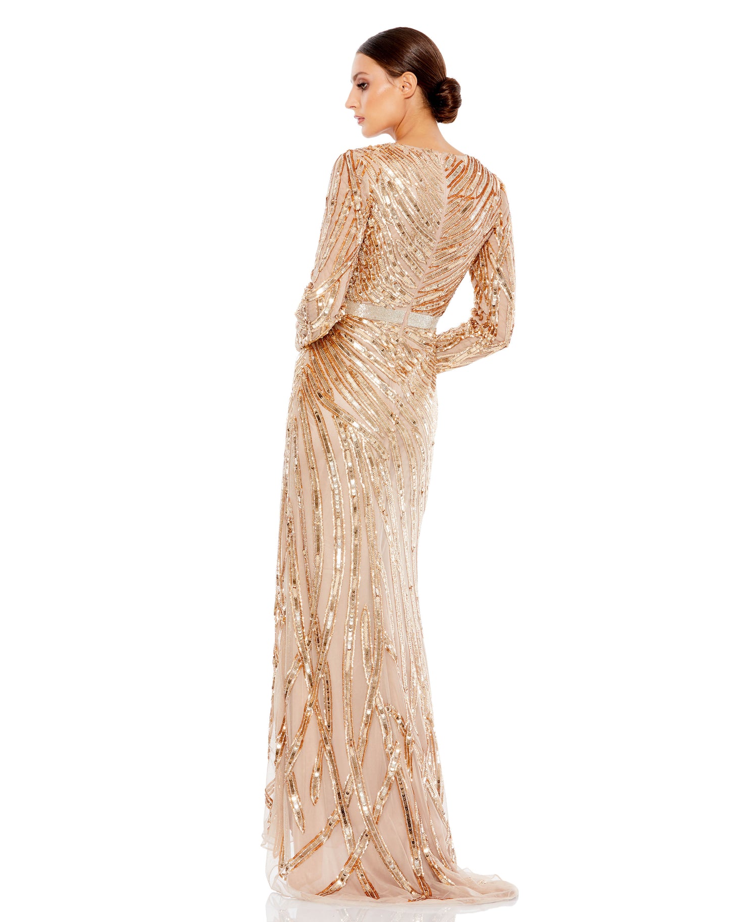 Made in an ultra-fine tulle fabric, this floor-grazing dress is embellished with flame-like rays of sequins. A sleek column shape fashioned with a surplice neckline and fitted long sleeves delivers a chic, contemporary look, while a beaded belt encircles