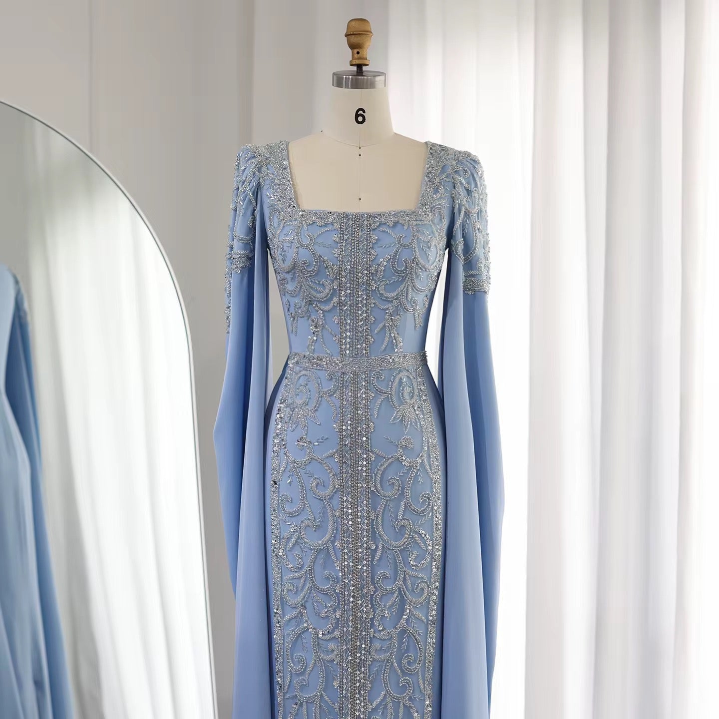 Kaftan style cape sleeves gown