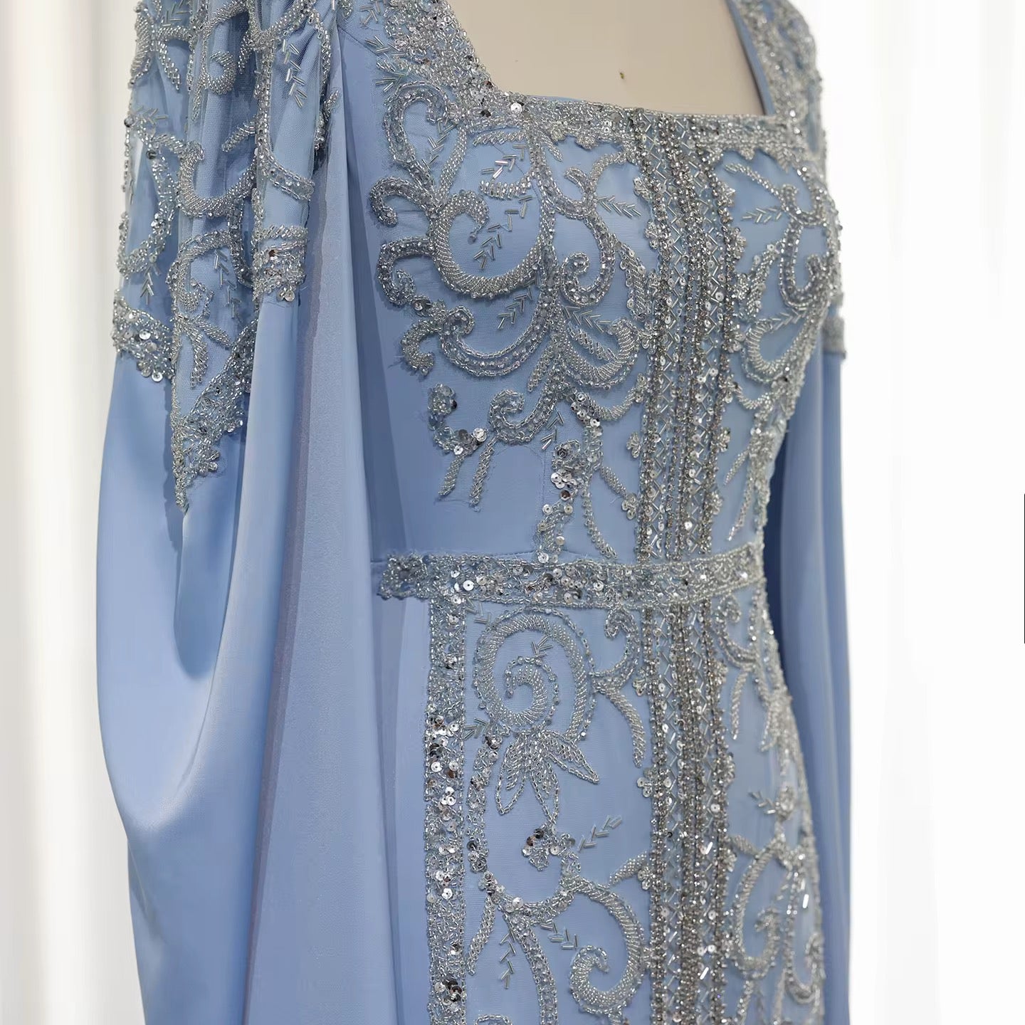 Kaftan style cape sleeves gown