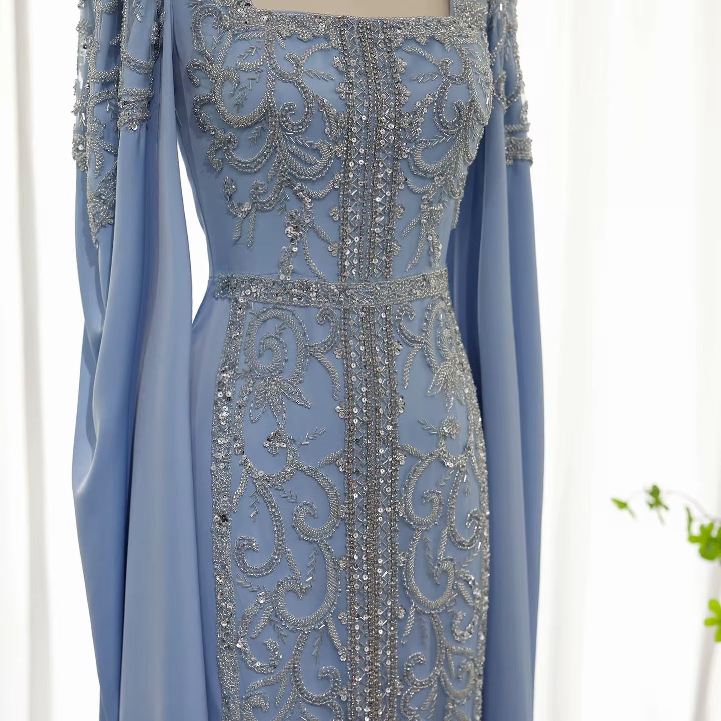 Kaftan style cape sleeves gown