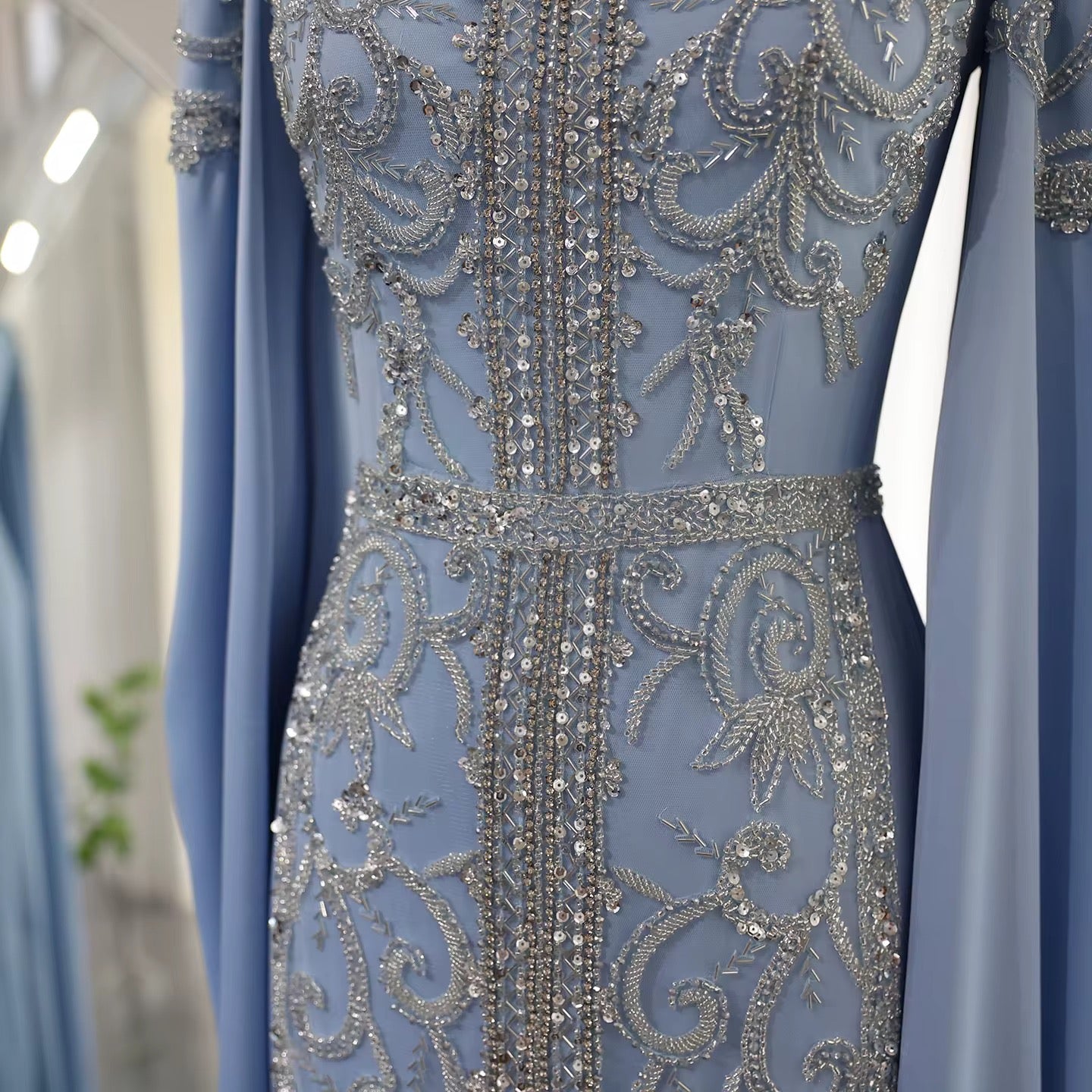 Kaftan style cape sleeves gown