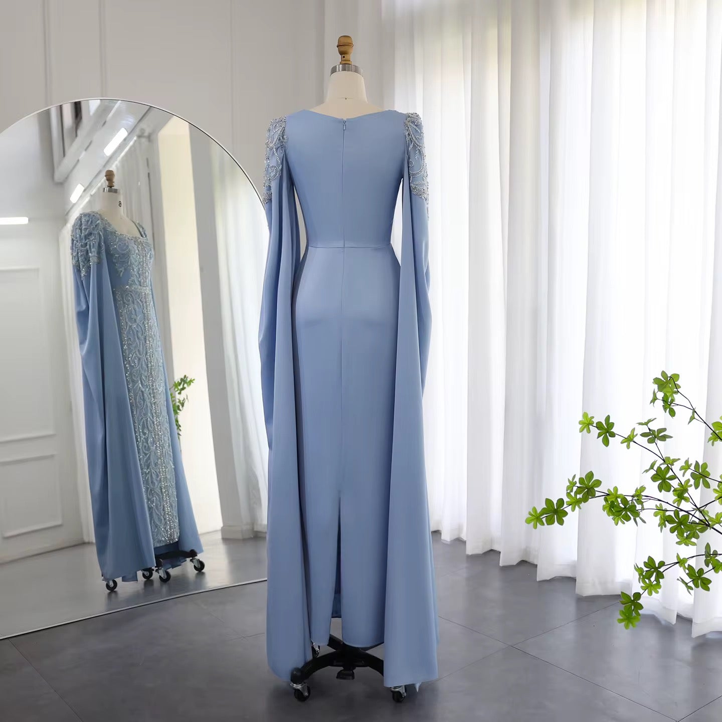 Kaftan style cape sleeves gown