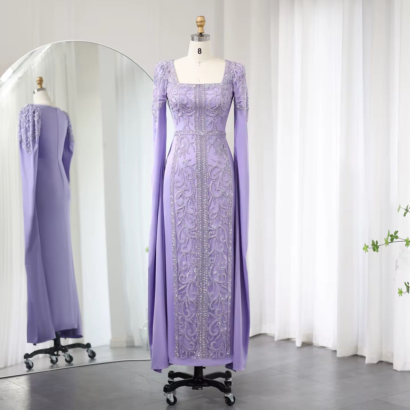 Kaftan style cape sleeves gown