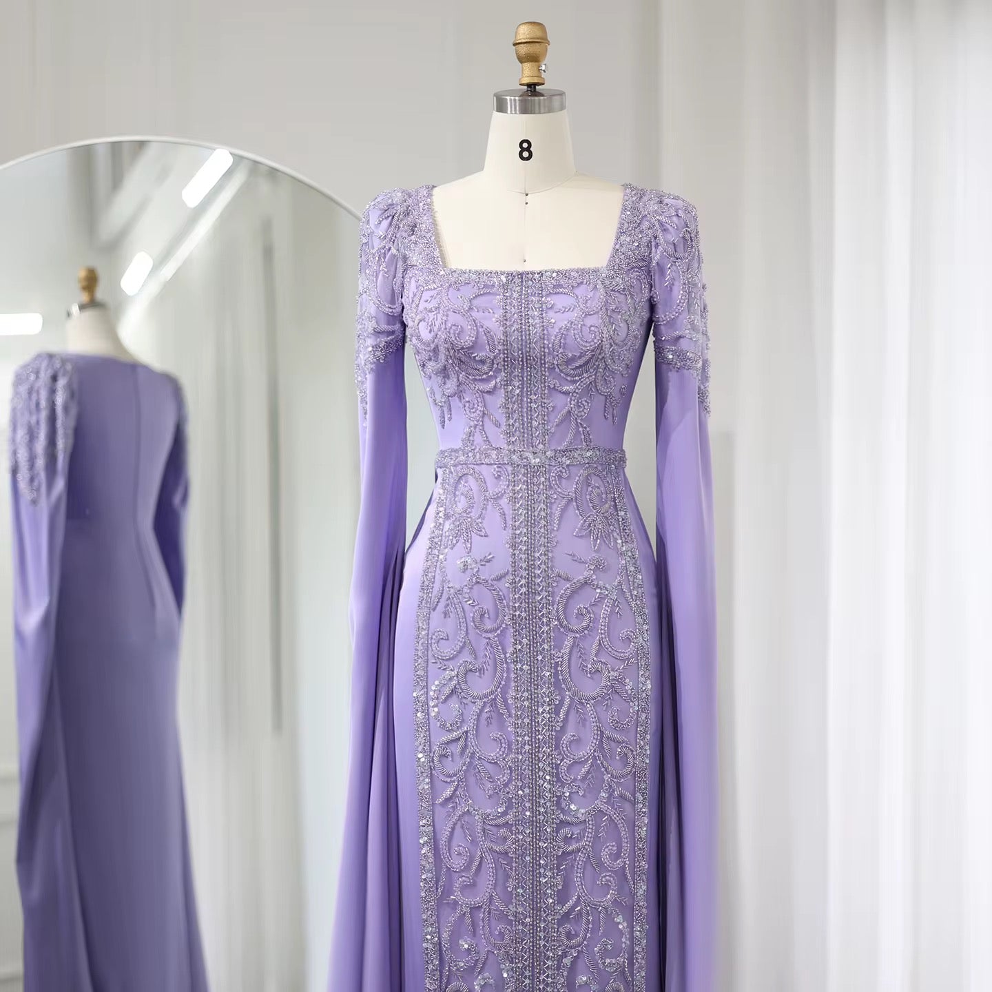 Kaftan style cape sleeves gown