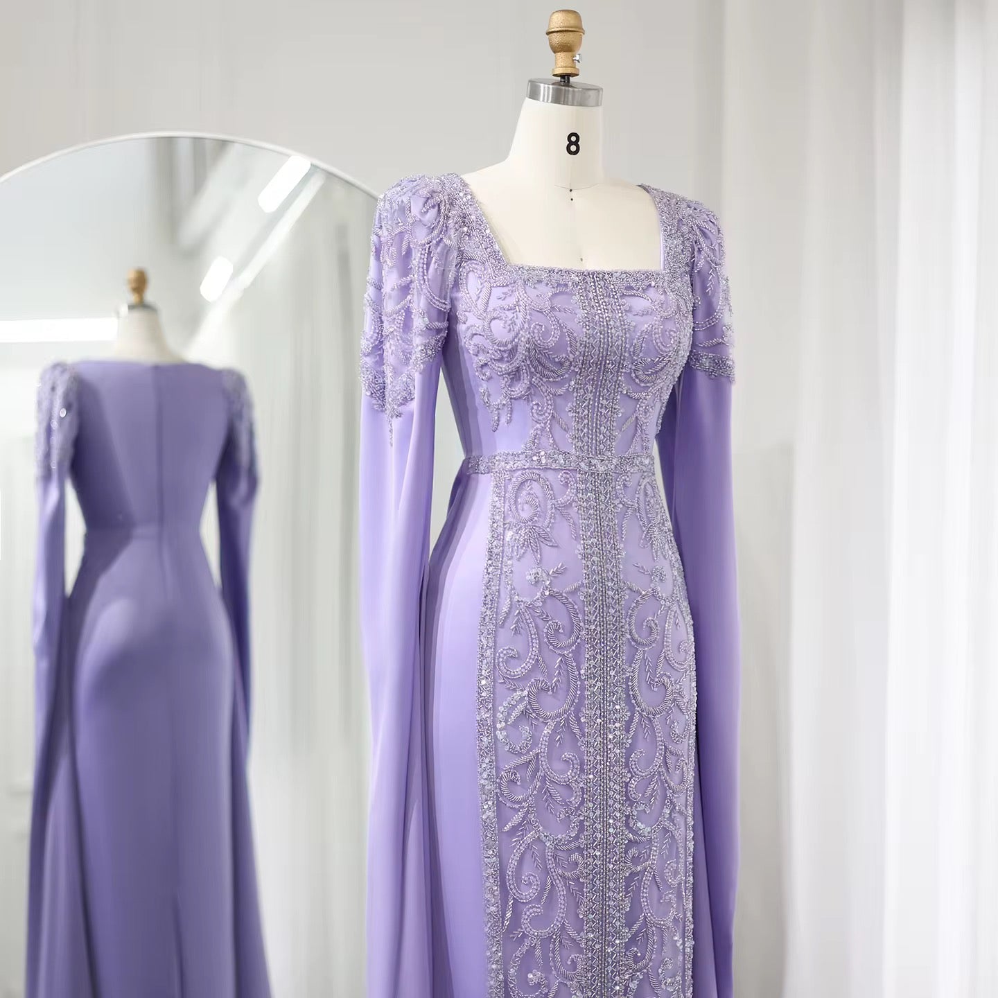 Kaftan style cape sleeves gown