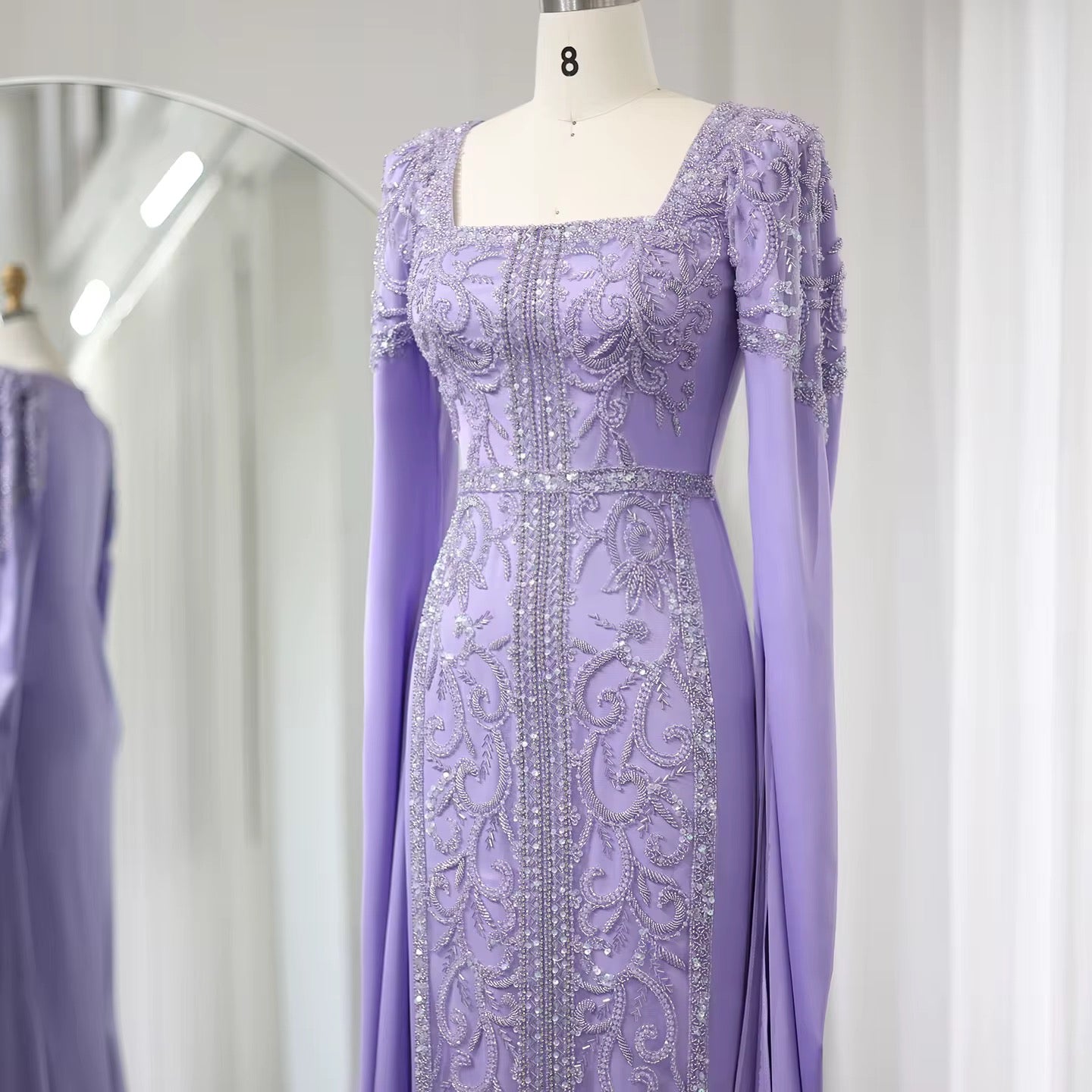 Kaftan style cape sleeves gown