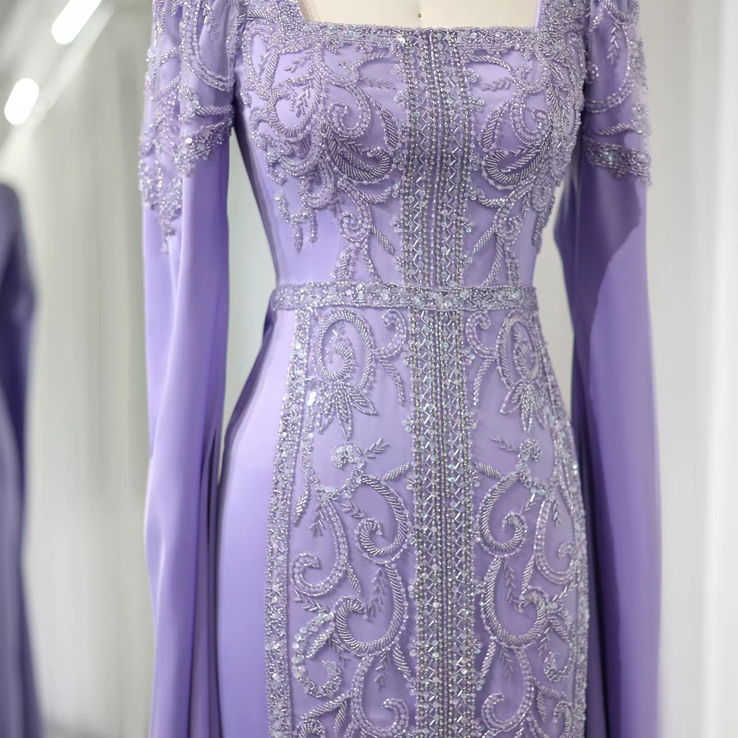 Kaftan style cape sleeves gown