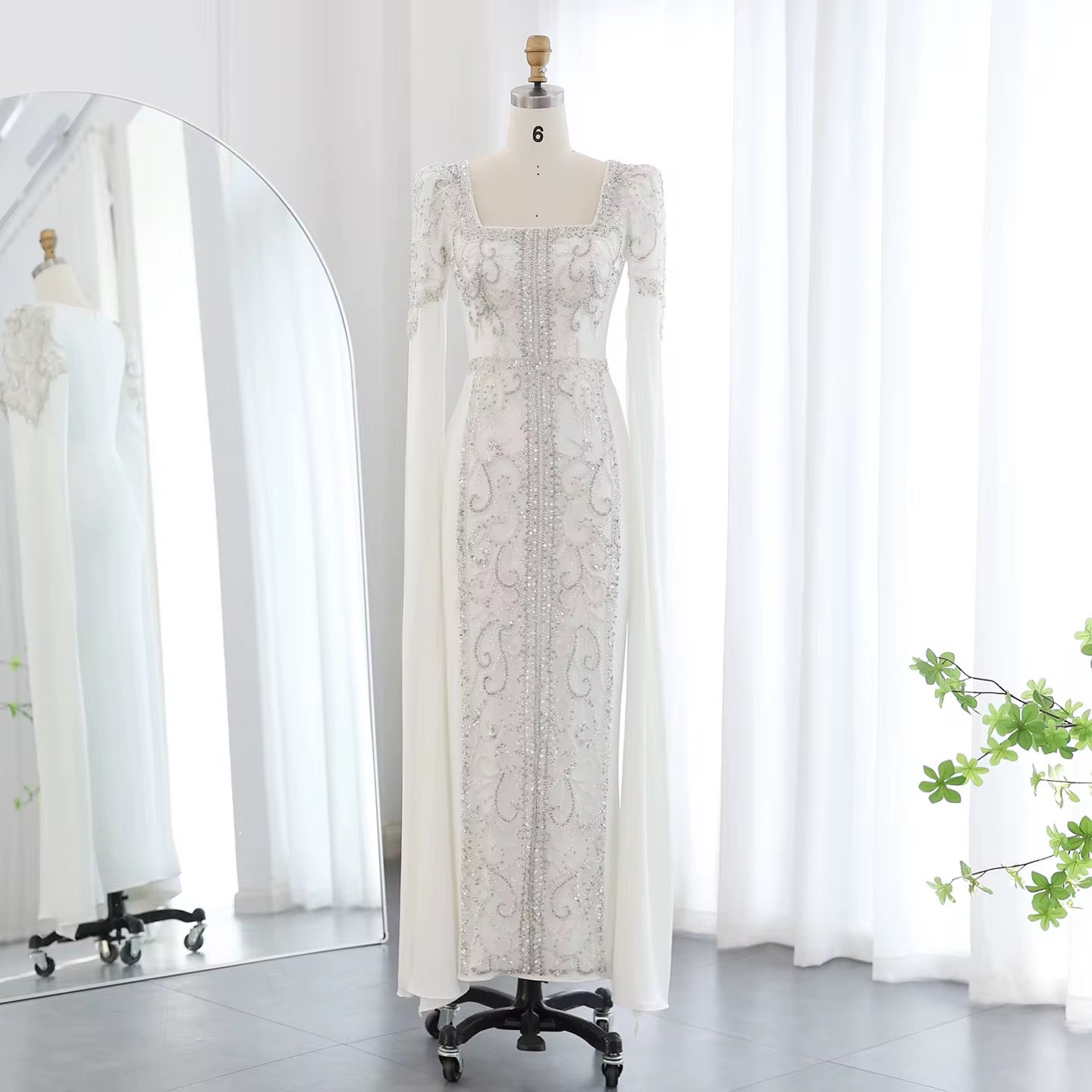 Kaftan style cape sleeves gown