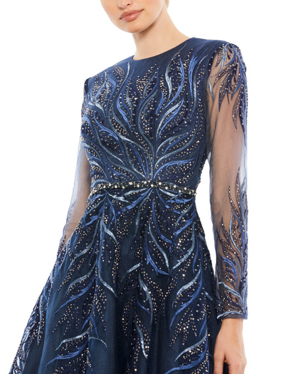 Embellished fit-and-flare cocktail dress with semi-sheer long sleeves and an elegant tea-length skirt. Mac Duggal Partially lined Back Zipper 100% Polyester Long Sleeve Tea-Length High Neck Style #11136