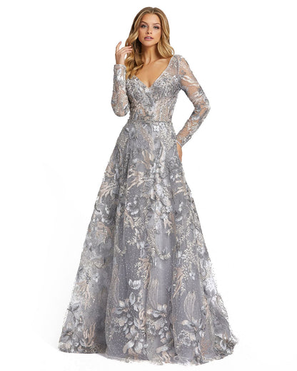 The bolder, the better. This jaw-dropping gown proves there’s no such thing as too ornate, flaunting an incredible design filled with botanical embroidery and dreamy crystal sparkle. The gown is styled with a V-neckline, sheer, embellished long sleeves an
