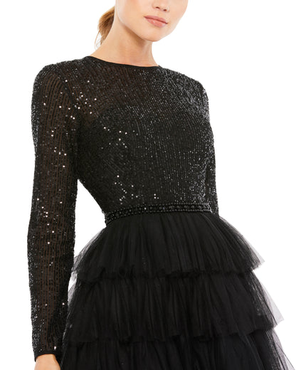 Chic tea-length dress with a sequined bodice, long sleeves, and a round neckline. A-line skirt features black layered tulle, and hand-beaded belt accents the natural waist. Ieena for Mac Duggal Fully Lined Back Zipper 100% Polyester Long Sleeve Cocktail H