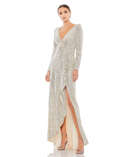 Long-sleeved sequin faux wrap gown with a flirty ruffle side slit and soft, sweeping train. Ieena for Mac Duggal Fully Lined Back Zipper 100% Polyester Long Sleeve Full Length V-Neck Style #26395