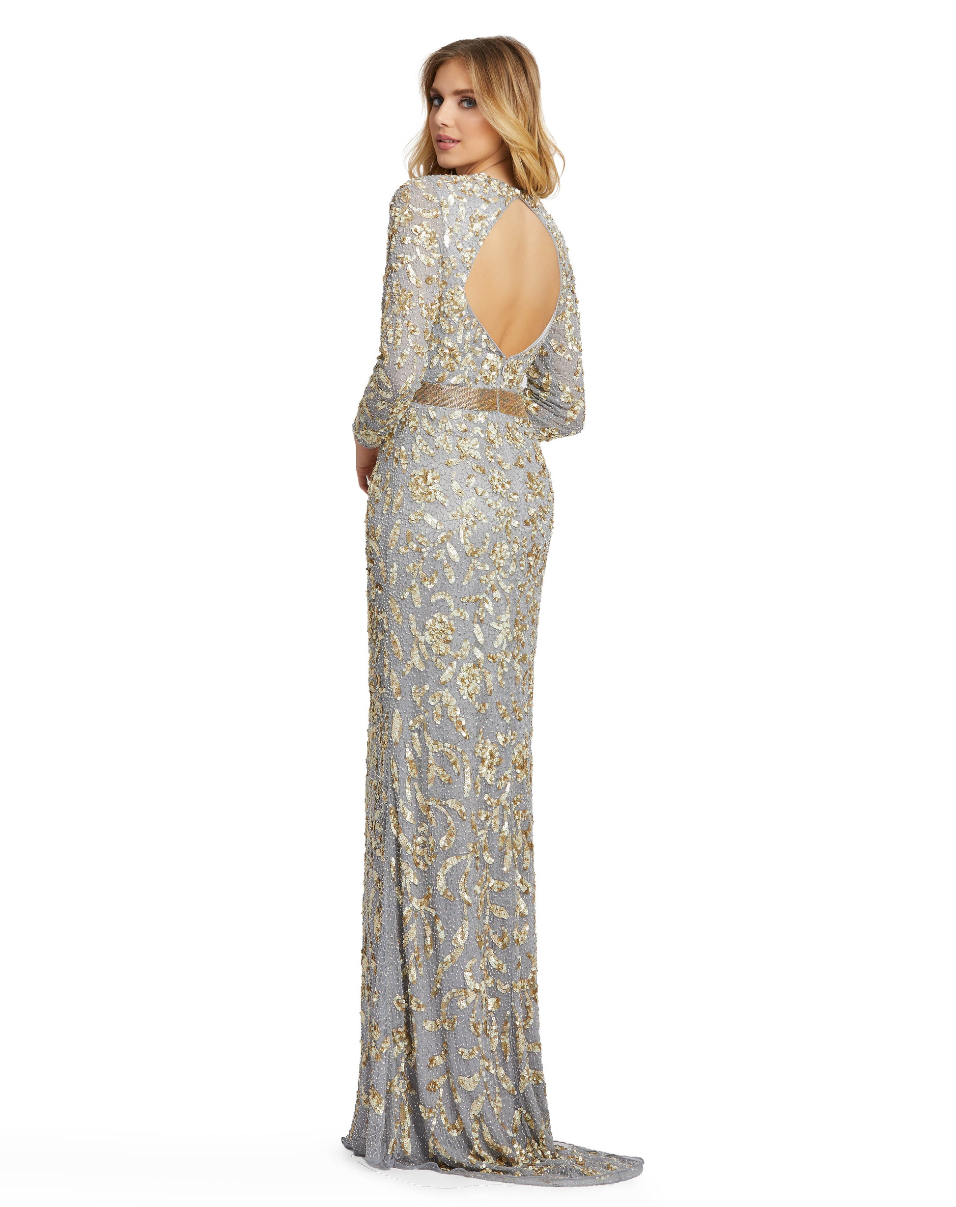 This beaded beauty is a dream-come-true dress. Mac Duggal translates your fantasies on a spellbinding gown made with thousands of seed beads and metallic sequins. The gown is cut in a column silhouette with fitted long sleeves, a decorative illusion bodic