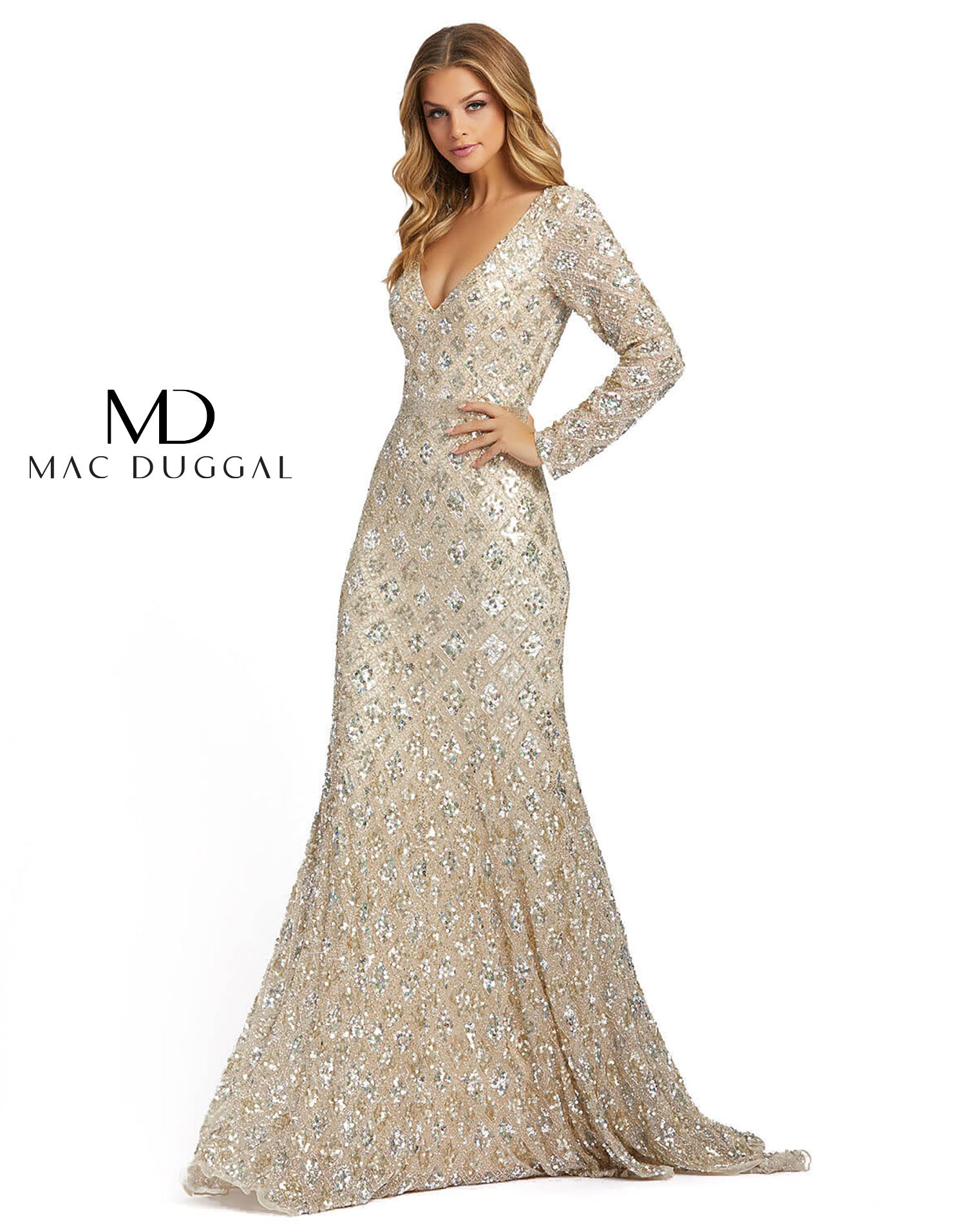Ombré evening gown with geometric embellishment throughout the mesh overlay. This elegant long-sleeve evening gown features a hand-beaded belt at the natural waist and a floor-length trumpet skirt. Mac Duggal Back zipper Fully lined through bodice and ski