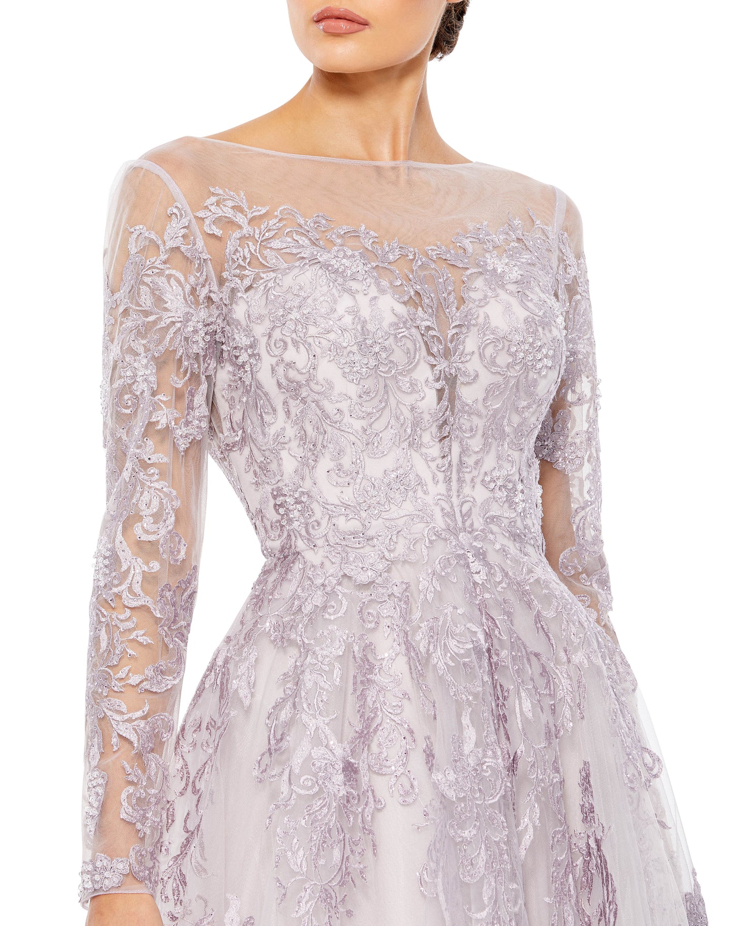 Mac Duggal Hand embellished tulle fabric (100% polyester) Partially lined bodice; fully lined skirt; semi-sheer unlined sleeves Illusion boat neckline Long sleeves Concealed back zipper Approx. 62.5" from top of shoulder to bottom hem Available in Lilac S