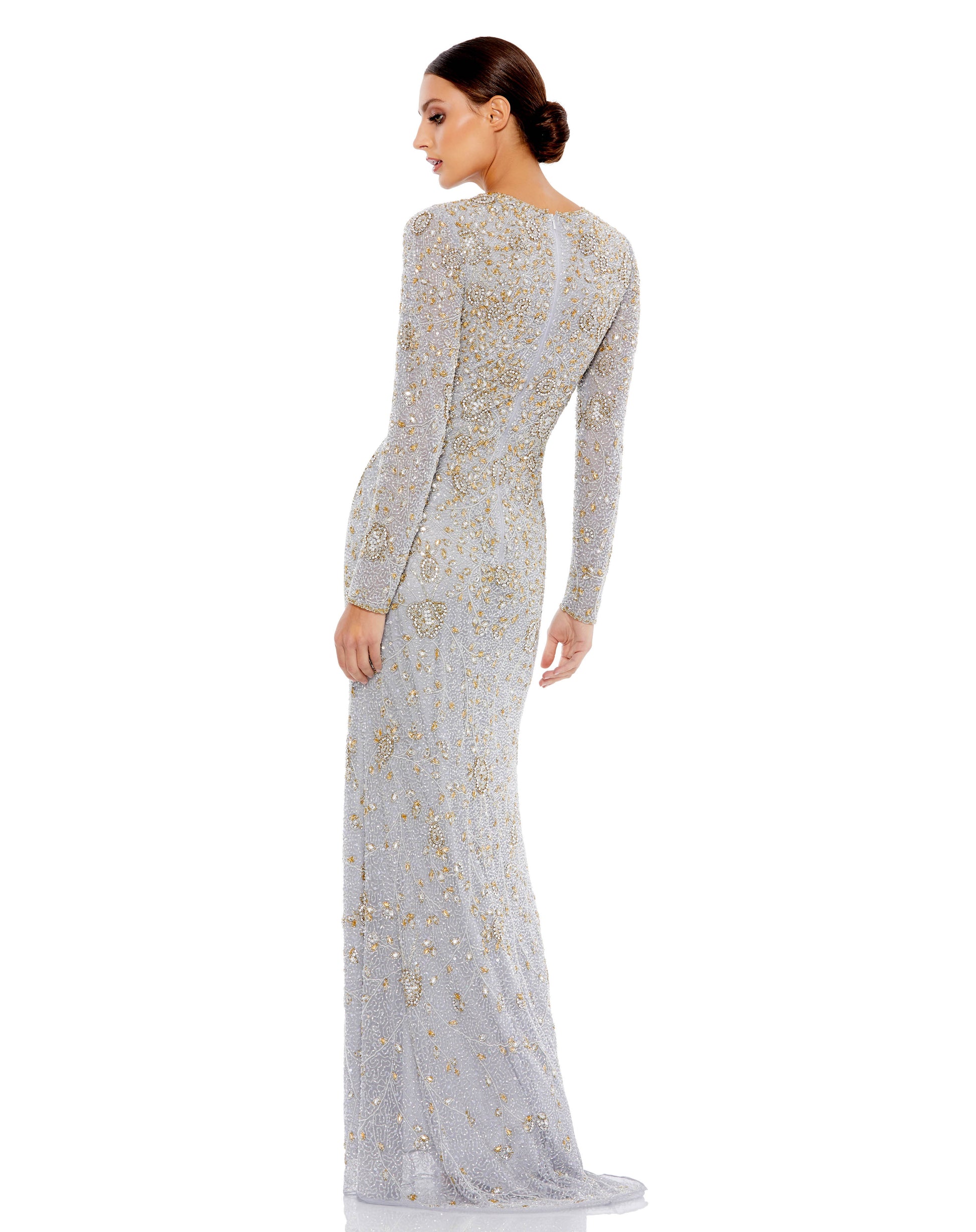 Elegant long-sleeved evening gown adorned with hand-sewn beading and intricate rhinestone detailing throughout. Mac Duggal Fully Lined Back Zipper 100% Polyester Long Sleeve Full Length Style #5308