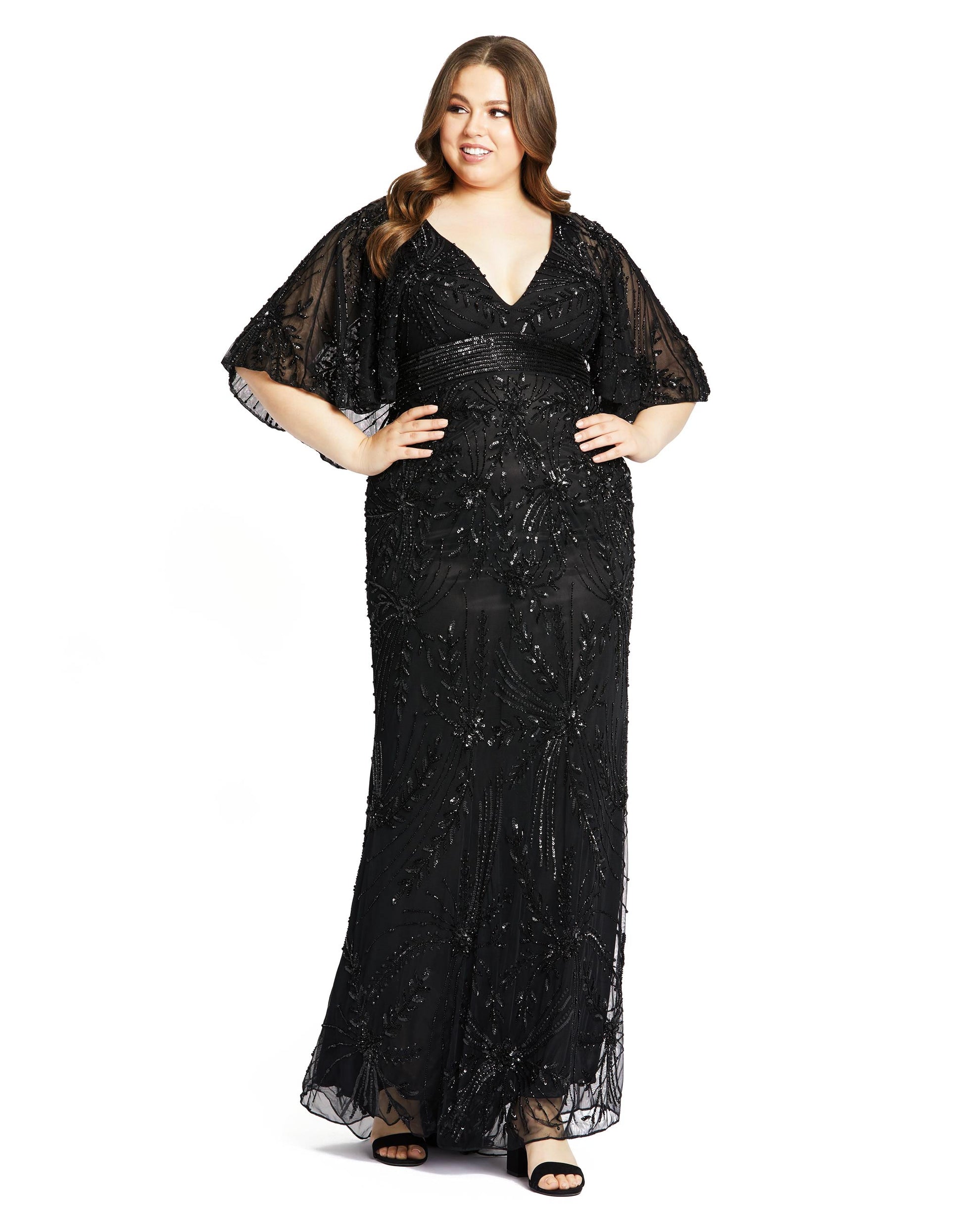 Vintage-inspired evening gown with flounce sleeves, intricate sequin detailing and sequined empire waist. Mac Duggal Fully Lined Back Zipper 100% Polyester Short Sleeve Full Length Plunging Neckline Style #5335