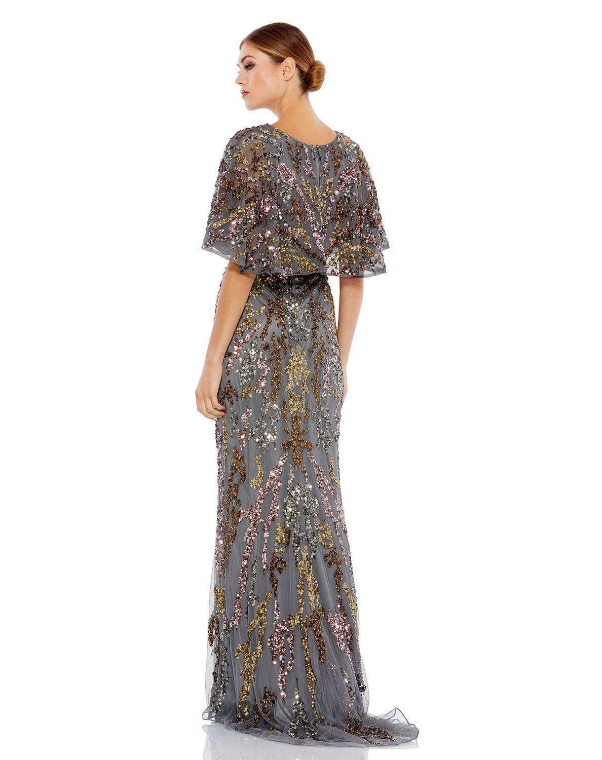This striking evening gown features a low v-neckline, sequin-belted empire waist, short bell sleeves, and a cape-style back. The gown's mesh overlay is ornately embellished with abstractly-patterned sequins. Mac Duggal Fully Lined 100% Polyester V-Neck Sh