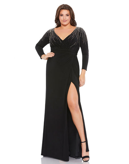 Showstopping Jersey gown with crystals and beading lining the bodice and a thigh-high slit. Mac Duggal Fully Lined Back Zipper 100% Polyester Long Sleeves Full Length Thigh-high slit Style #67739
