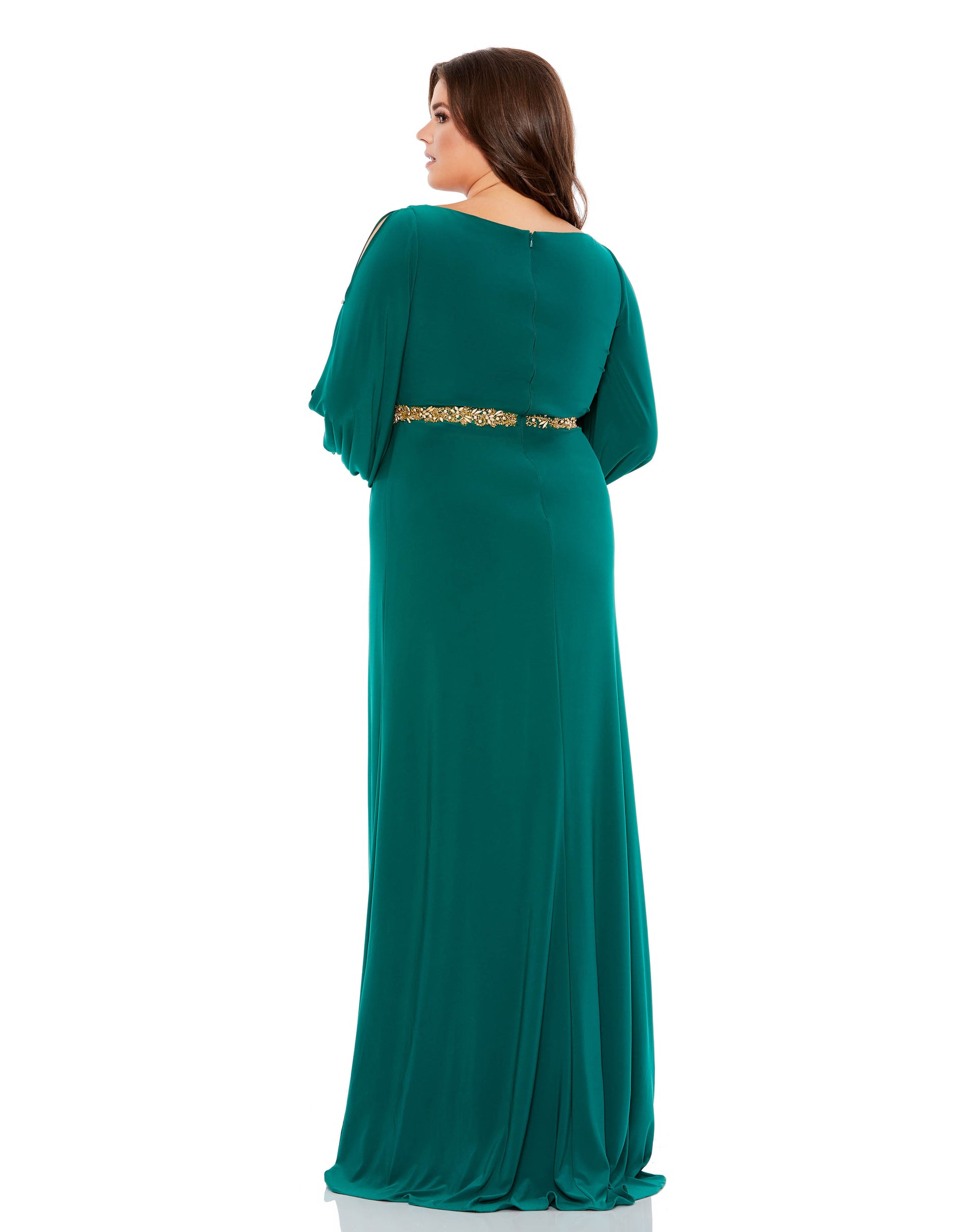 Elegant floor-length gown with a faux-wrap v-neckline, gathered waist, long split sleeves, and a thigh-high slit. A hand-embellished belt defines the natural waist. Mac Duggal 100% Polyester Back Zipper Long Sleeves V-Neck Full Length Style #67747