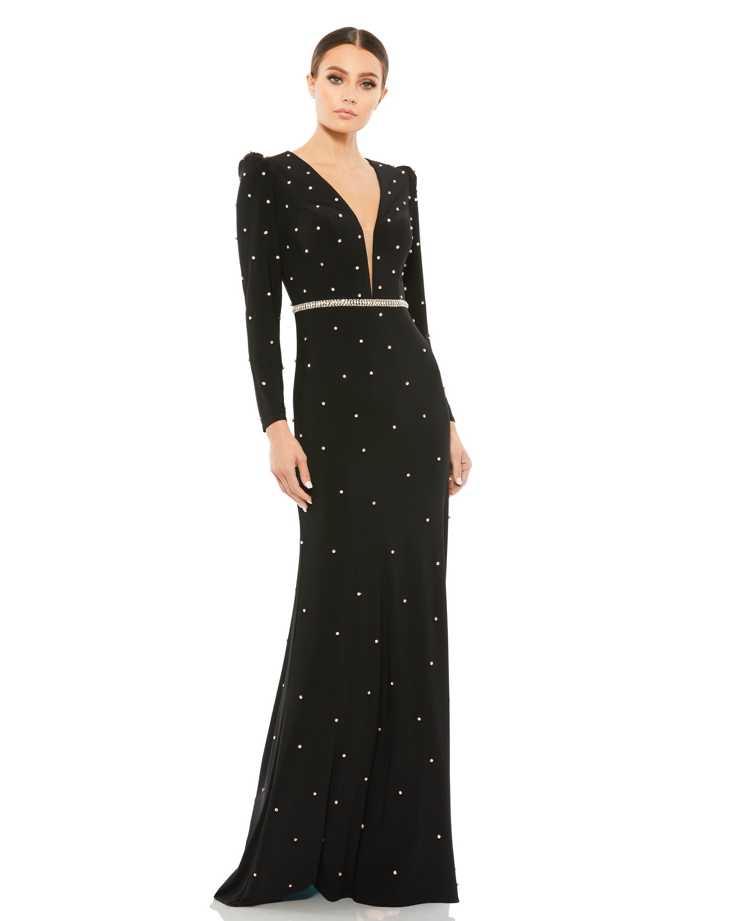 Ieena for Mac Duggal Jersey fabric (100% polyester) Fully lined through body Plunging v-neckline Long sleeves Mesh bust inset Puff shoulders All-over jewel encrusted embellishments Rhinestone detailed waist Concealed back zipper Approx. 62.5" from top of