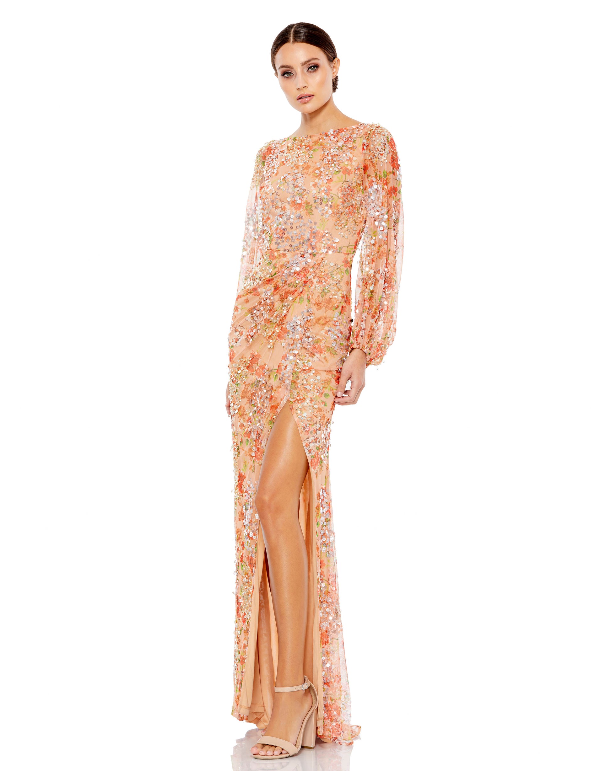 Stunning floral print gown with blouson sleeves, sequin detailing, and thigh-high slit. Mac Duggal Fully Lined 100% Polyester Long Sleeve Thigh-High Slit Full Length Style #93547