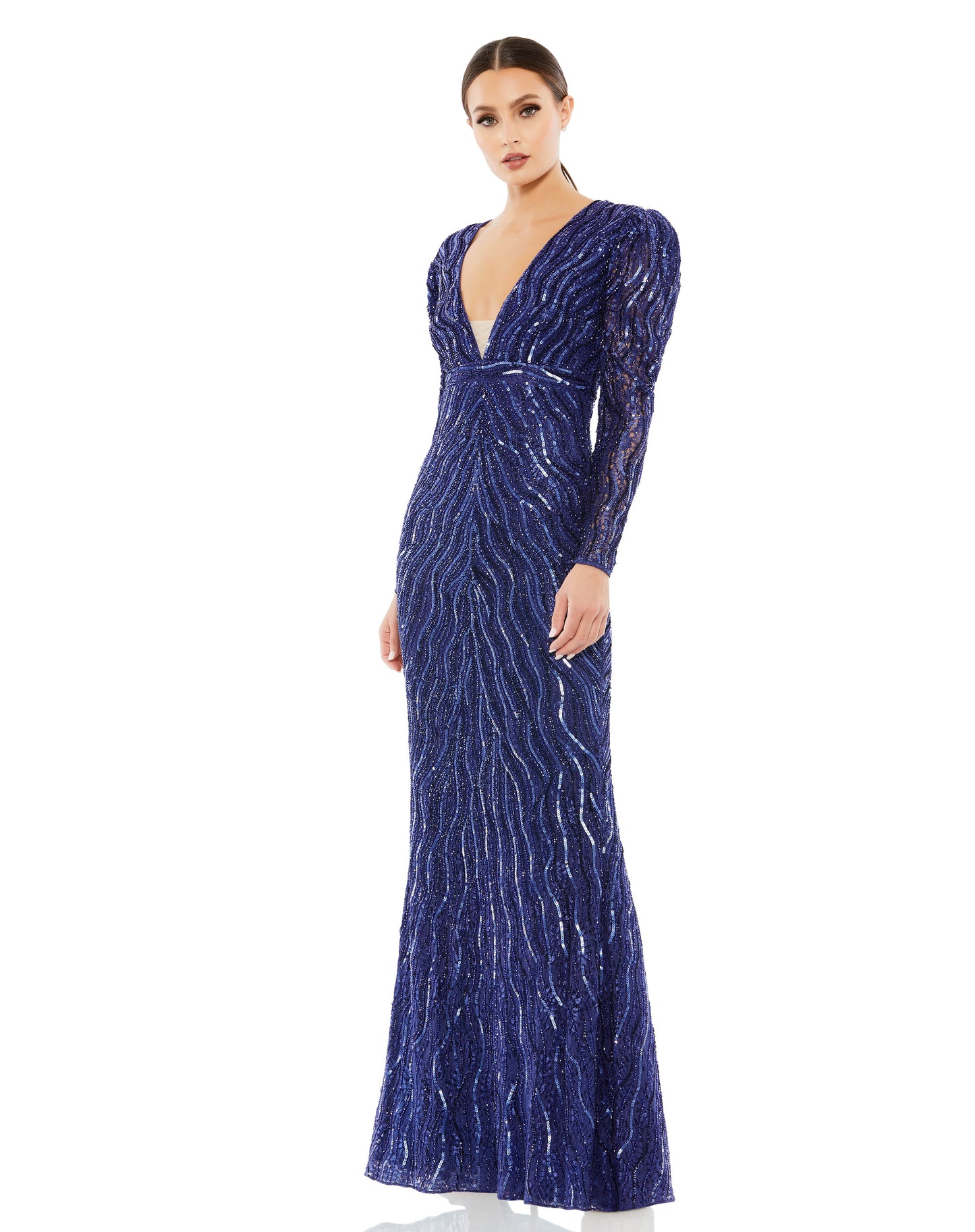 Elegant puff sleeve trumpet gown adorned with sequins and beading throughout. Plunging v-neckline features a semi-sheer mesh inset, and an embellished waistband defines the waist. Mac Duggal Fully Lined Back Zipper 100% Polyester Long Sleeve Full Length V