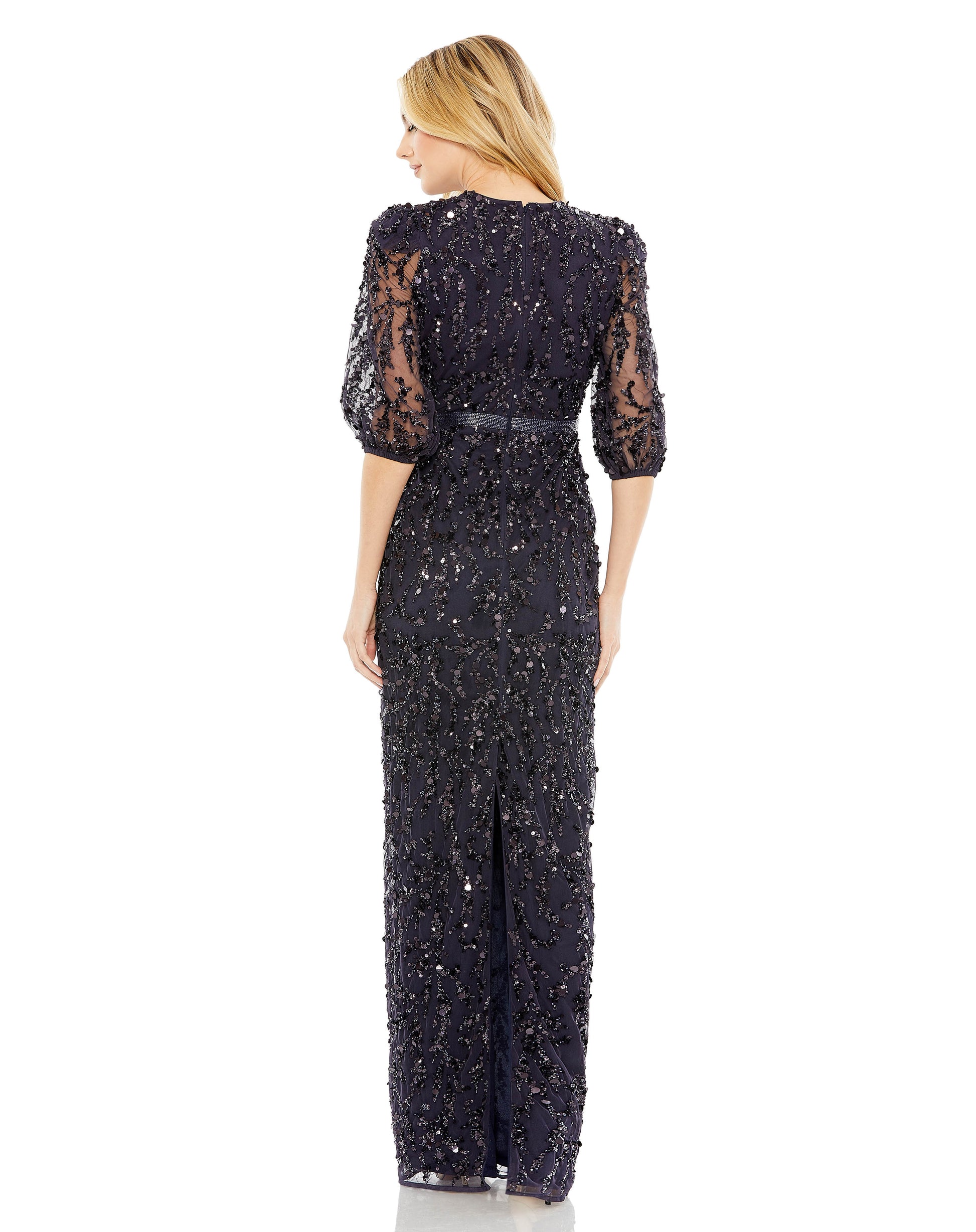 Mac Duggal Sequin fabric (100% polyester) Fully lined through bodice and skirt; sheer unlined sleeves High neckline Puff elbow sleeves Beaded waist detail Concealed back zipper Approx. 62.5" from top of shoulder to bottom hem Available in Midnight (dark b
