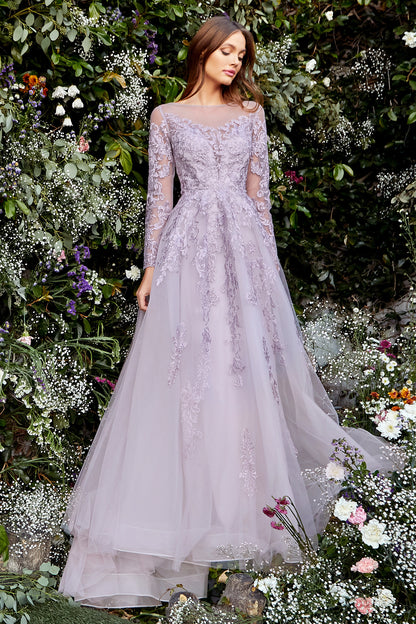 Regal, elegant yet soft, Diana Gown is truly a gown for a queen. Luxurious violet embroidery glitters with embedded crystals and beautifully frames the bodice, embellish the long sleeves, and continues down the A-line skirt. The soft sheer violet layers o