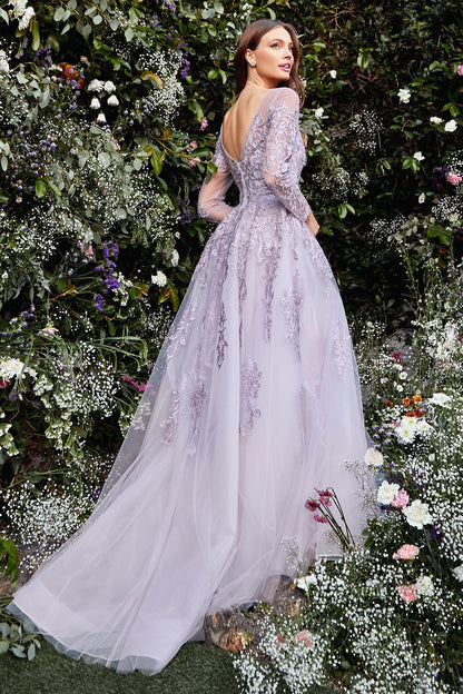 Regal, elegant yet soft, Diana Gown is truly a gown for a queen. Luxurious violet embroidery glitters with embedded crystals and beautifully frames the bodice, embellish the long sleeves, and continues down the A-line skirt. The soft sheer violet layers o